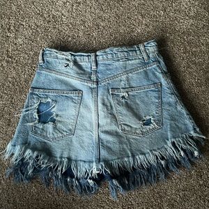 Distressed denim skort